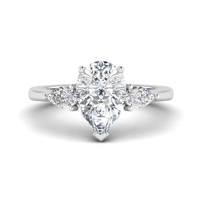 IGI certified pear cut lab grown diamond three stone engagement ring with pear side diamonds in white gold.