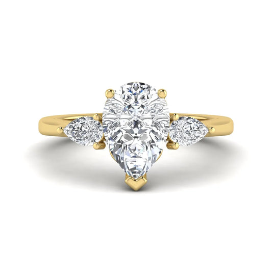 IGI certified pear cut lab grown diamond three stone engagement ring with pear side diamonds in yellow gold.