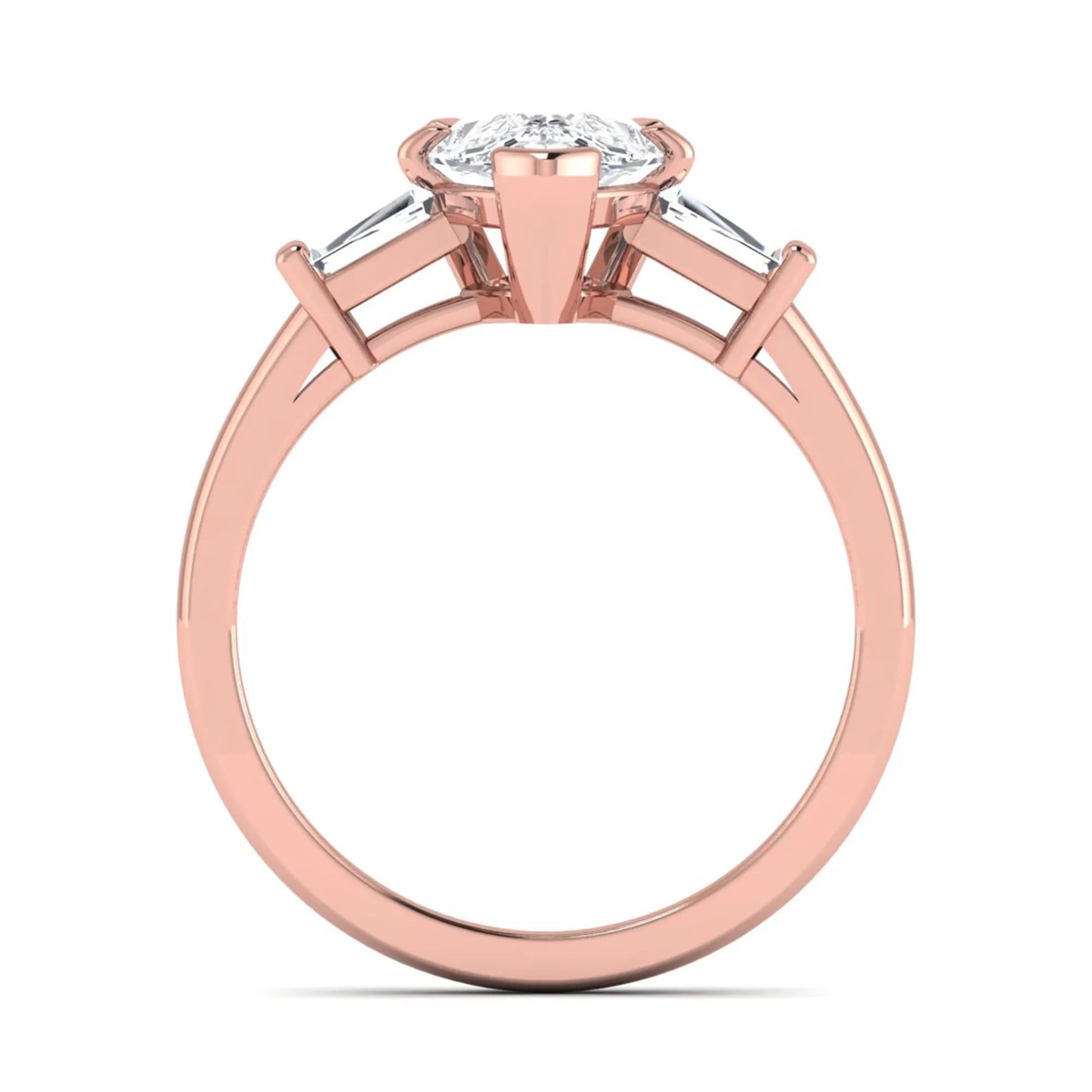 Pear cut lab grown diamond three stone engagement ring featuring a 2.31 carat IGI certified center diamond with tapered baguette side diamonds in rose gold.