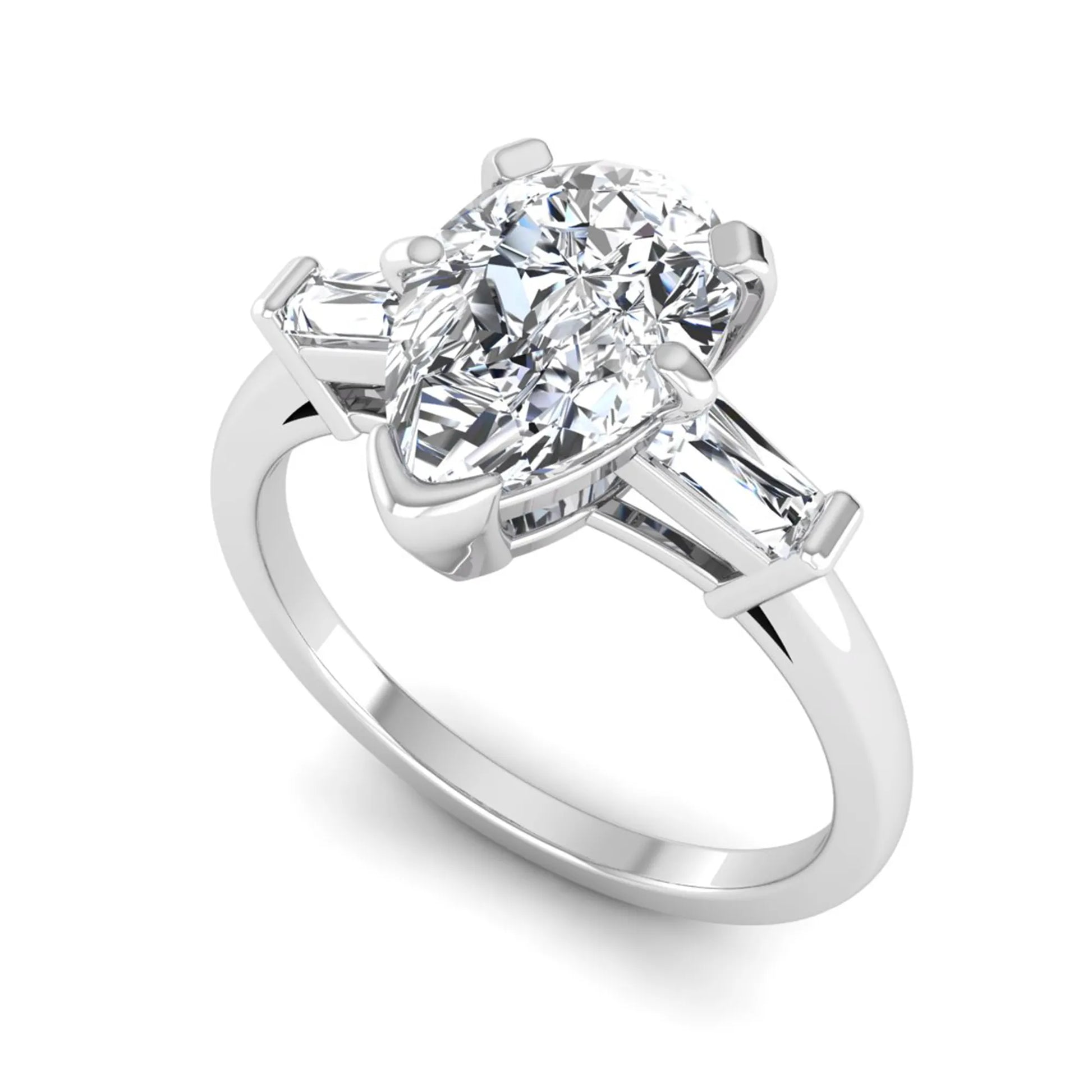 Pear cut lab grown diamond three stone engagement ring featuring a 2.31 carat IGI certified center diamond with tapered baguette side diamonds in white gold.