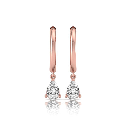 Pear cut lab grown diamond drop huggie hoop earrings featuring a three prong setting, hinged snap closure, and polished rose gold tone finish.