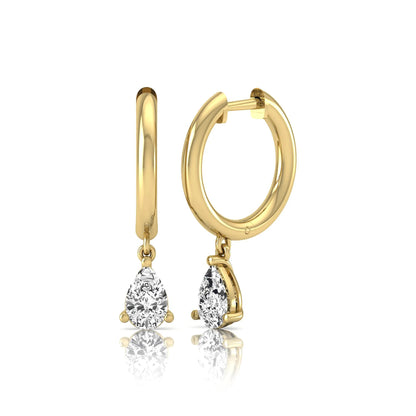 Pear cut lab grown diamond drop huggie hoop earrings featuring a three prong setting, hinged snap closure, and polished yellow gold tone finish.