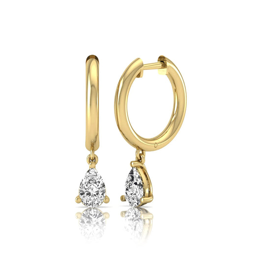 Pear cut lab grown diamond drop huggie hoop earrings featuring a three prong setting, hinged snap closure, and polished yellow gold tone finish.