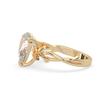 Pear floral three stone lab grown diamond engagement ring with 3 carat center diamond in yellow gold