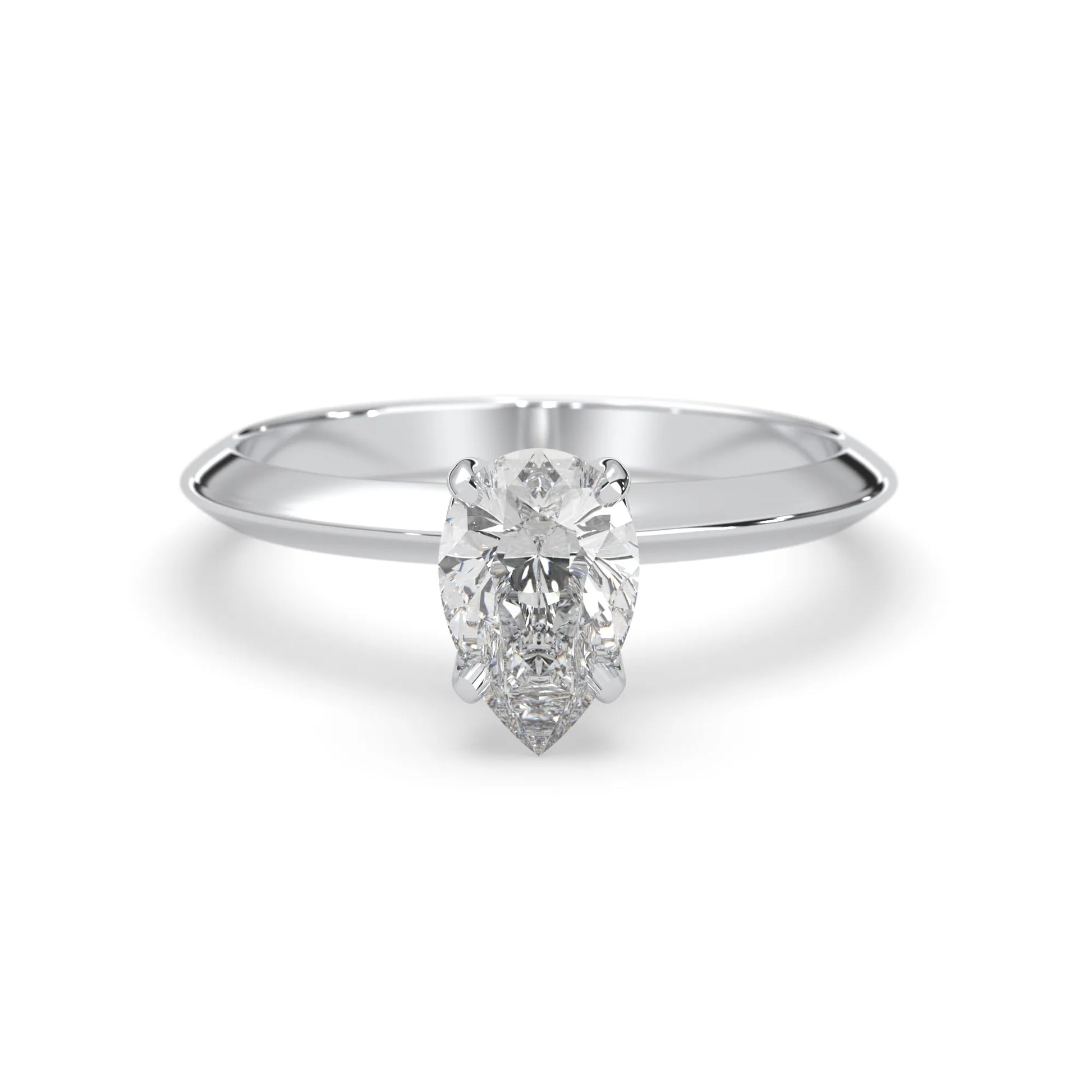 white-gold ring with a pear-shaped diamond on a white background