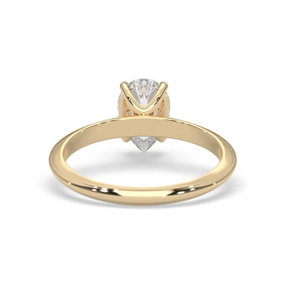 yellow-Gold ring with a diamond on a white background