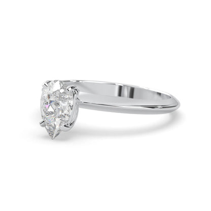white-gold Diamond ring with a pear-shaped gemstone on a white background