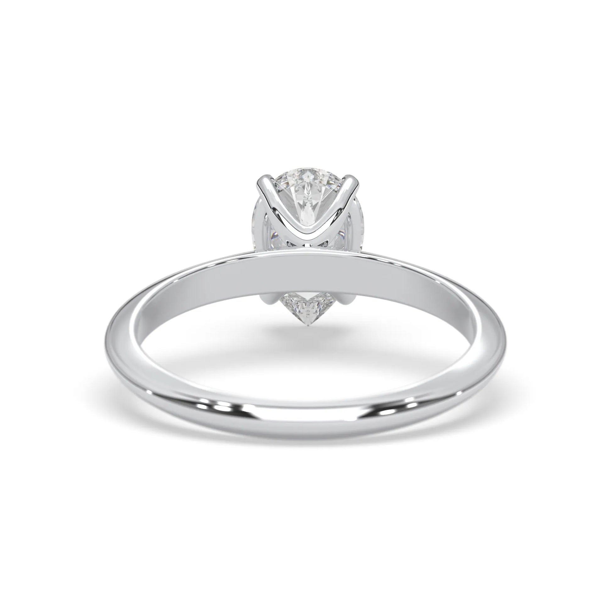 white-gold ring with a diamond on a white background