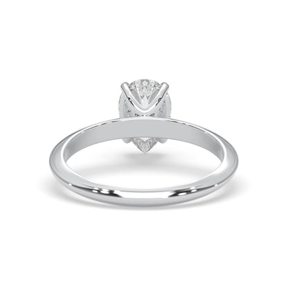 white-gold ring with a diamond on a white background