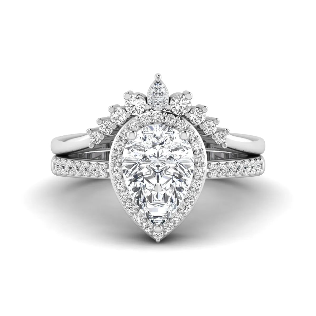 Pear Halo Crown Bridal Ring Set featuring a 10.00 × 7.00 mm pear-cut lab grown diamond with a pear-shaped halo, tiara-inspired crown diamond accents, cathedral pavé engagement ring, and matching contoured double-row pavé wedding band in white gold