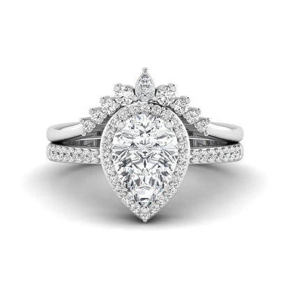 Pear Halo Crown Bridal Ring Set featuring a 10.00 × 7.00 mm pear-cut lab grown diamond with a pear-shaped halo, tiara-inspired crown diamond accents, cathedral pavé engagement ring, and matching contoured double-row pavé wedding band in white gold