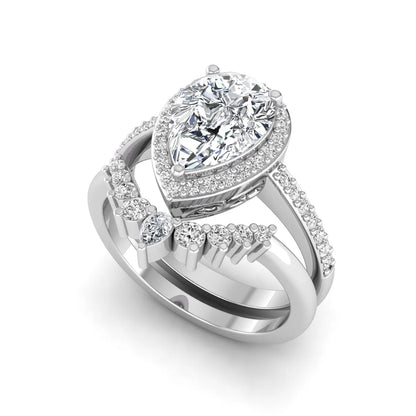 Pear Halo Crown Bridal Ring Set featuring a 10.00 × 7.00 mm pear-cut lab grown diamond with a pear-shaped halo, tiara-inspired crown diamond accents, cathedral pavé engagement ring, and matching contoured double-row pavé wedding band in white gold