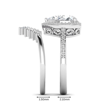Pear Halo Crown Bridal Ring Set featuring a 10.00 × 7.00 mm pear-cut lab grown diamond with a pear-shaped halo, tiara-inspired crown diamond accents, cathedral pavé engagement ring, and matching contoured double-row pavé wedding band in white gold