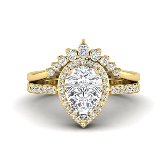 Pear Halo Crown Bridal Ring Set featuring a 10.00 × 7.00 mm pear-cut lab grown diamond with a pear-shaped halo, tiara-inspired crown diamond accents, cathedral pavé engagement ring, and matching contoured double-row pavé wedding band in yellow gold