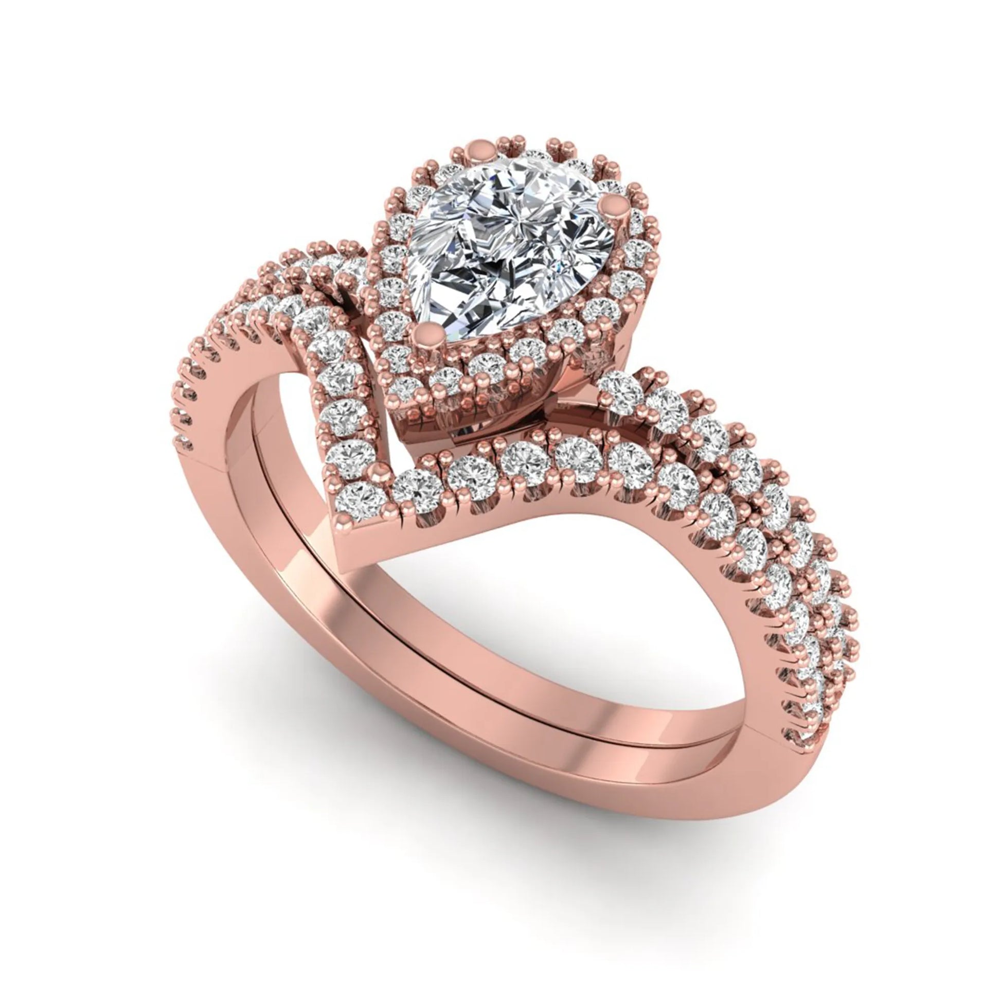 Pear cut lab grown diamond bridal ring set featuring a halo engagement ring with a matching curved pavé wedding band in a rose gold tone design.