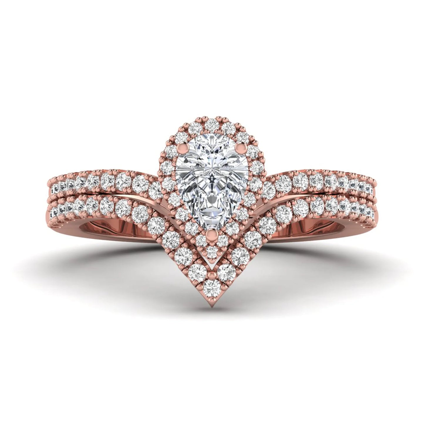 Pear cut lab grown diamond bridal ring set featuring a halo engagement ring with a matching curved pavé wedding band in a rose gold tone design.