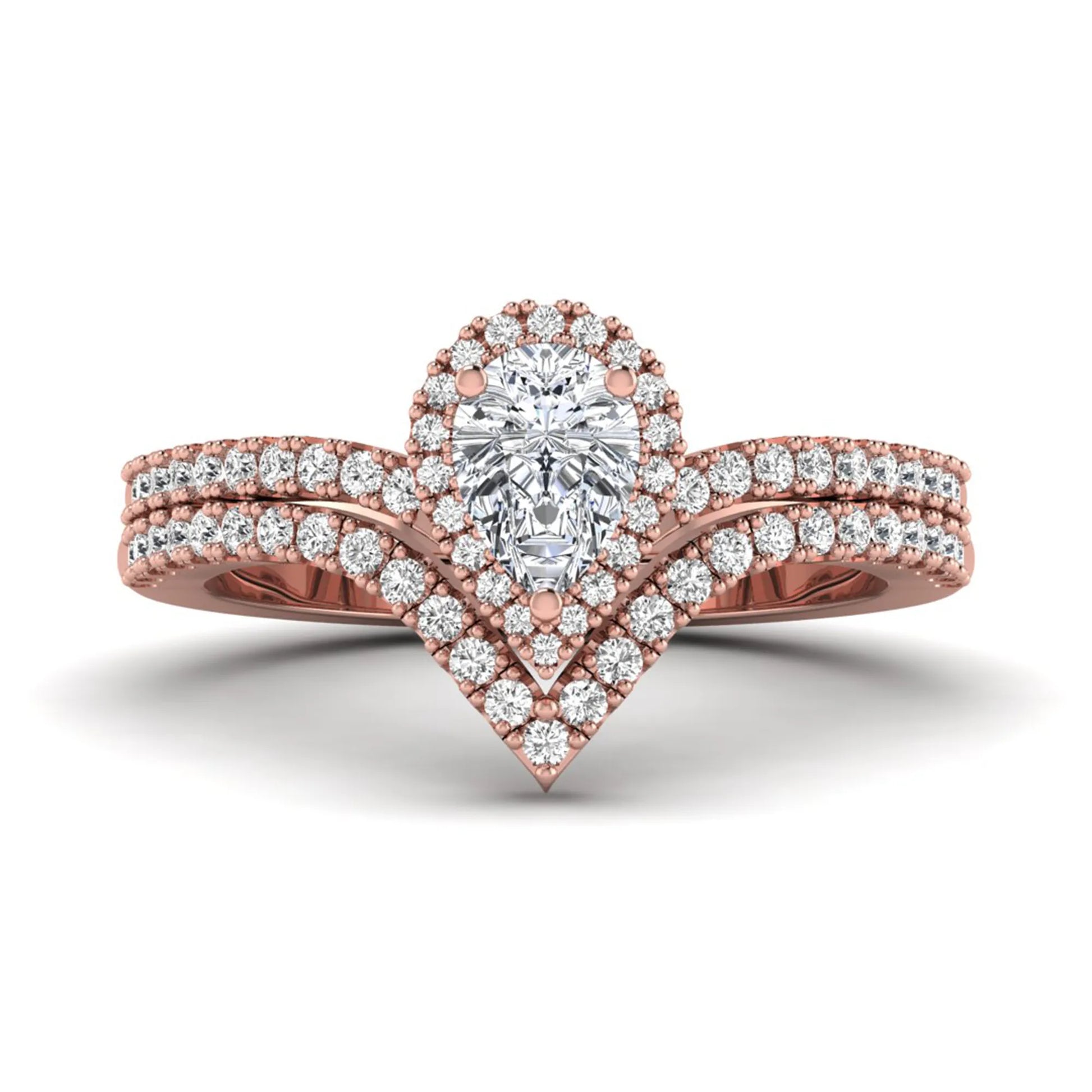 Pear cut lab grown diamond bridal ring set featuring a halo engagement ring with a matching curved pavé wedding band in a rose gold tone design.
