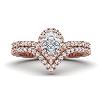 Pear cut lab grown diamond bridal ring set featuring a halo engagement ring with a matching curved pavé wedding band in a rose gold tone design.