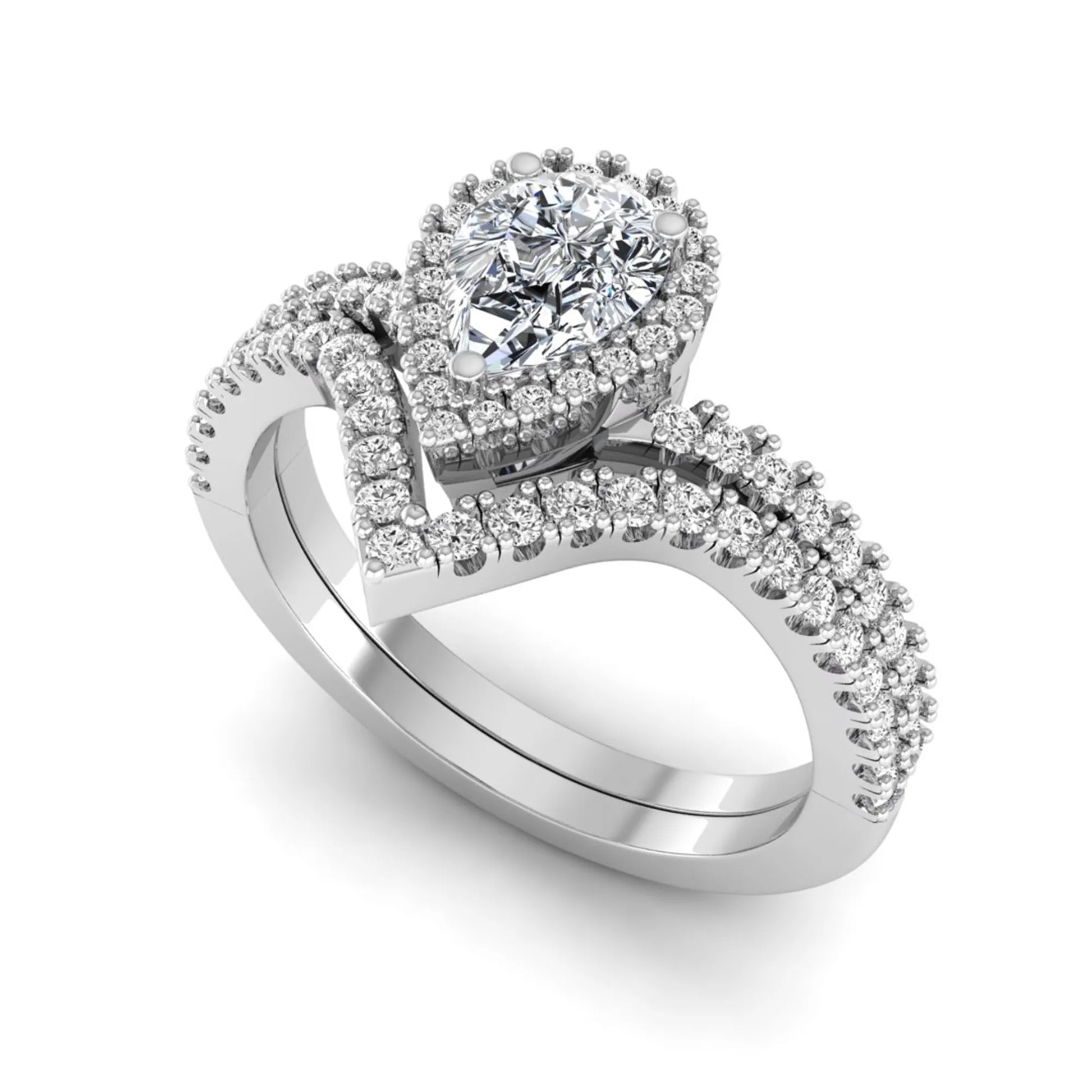 Pear cut lab grown diamond bridal ring set featuring a halo engagement ring with a matching curved pavé wedding band in a white gold tone design.