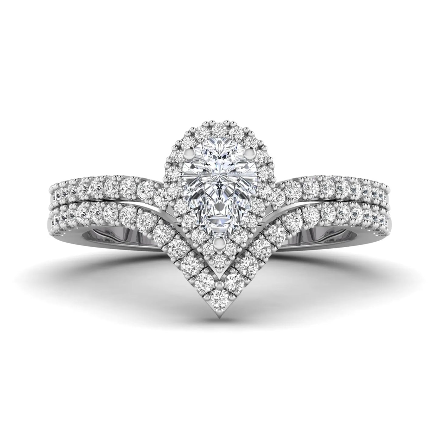 Pear cut lab grown diamond bridal ring set featuring a halo engagement ring with a matching curved pavé wedding band in a white gold tone design.