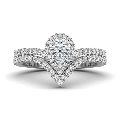 Pear cut lab grown diamond bridal ring set featuring a halo engagement ring with a matching curved pavé wedding band in a white gold tone design.