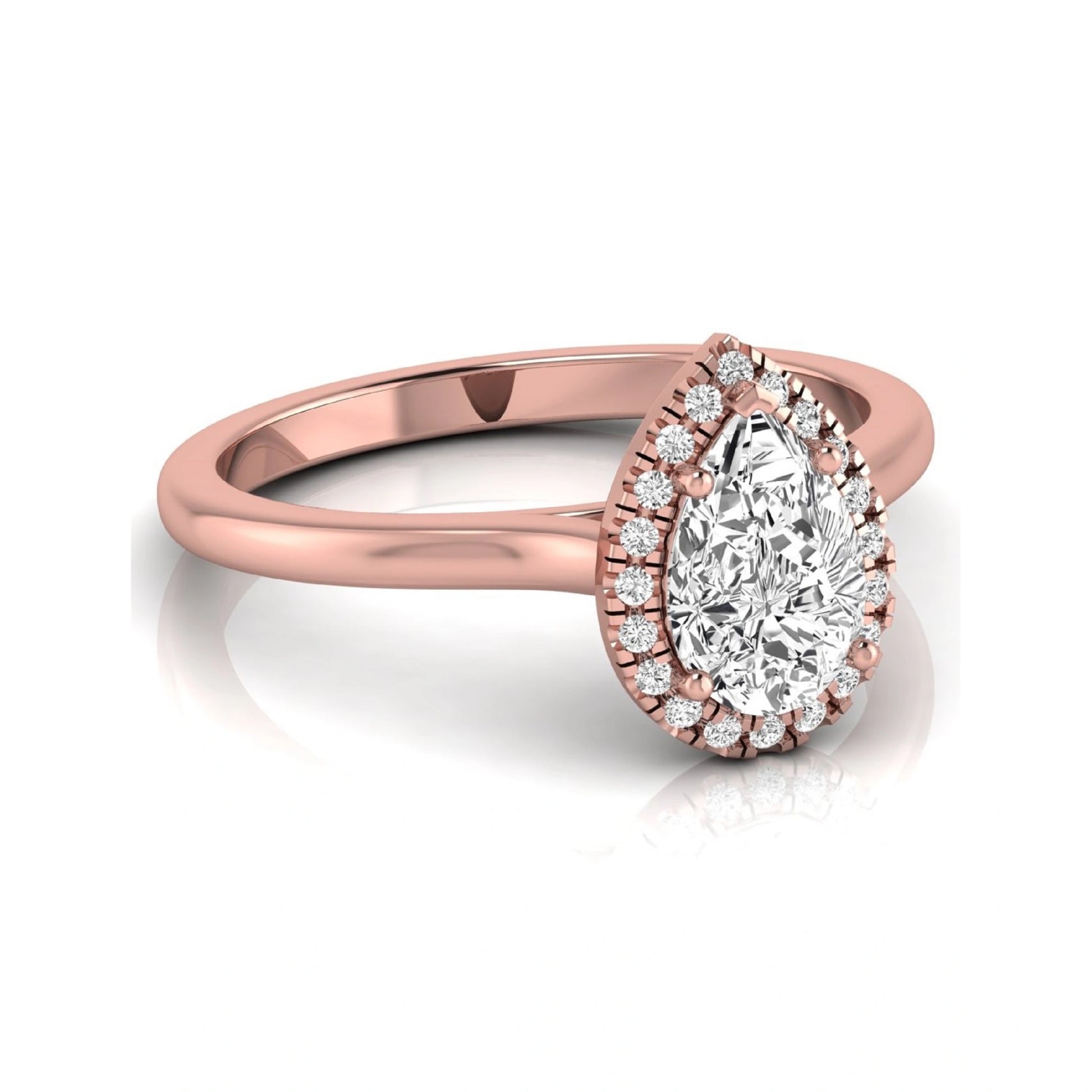 Pear cut lab grown diamond engagement ring featuring a 1.33 carat center diamond surrounded by a sparkling round diamond halo with a polished rose gold band.