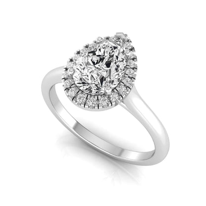 Pear cut lab grown diamond engagement ring featuring a 1.33 carat center diamond surrounded by a sparkling round diamond halo with a polished white gold band.
