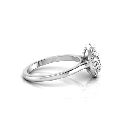 Pear cut lab grown diamond engagement ring featuring a 1.33 carat center diamond surrounded by a sparkling round diamond halo with a polished white gold band.