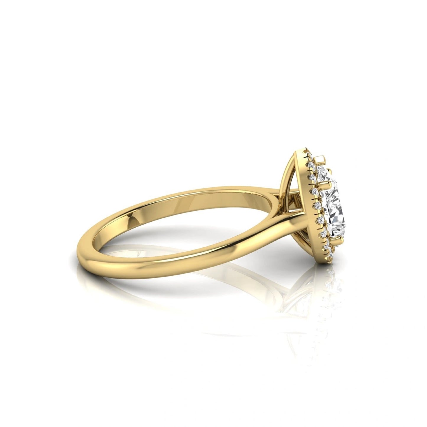 Pear cut lab grown diamond engagement ring featuring a 1.33 carat center diamond surrounded by a sparkling round diamond halo with a polished yellow gold band.