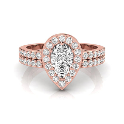 Pear cut lab grown diamond engagement ring with a round diamond halo and double-row pavé band in a rose gold style design.