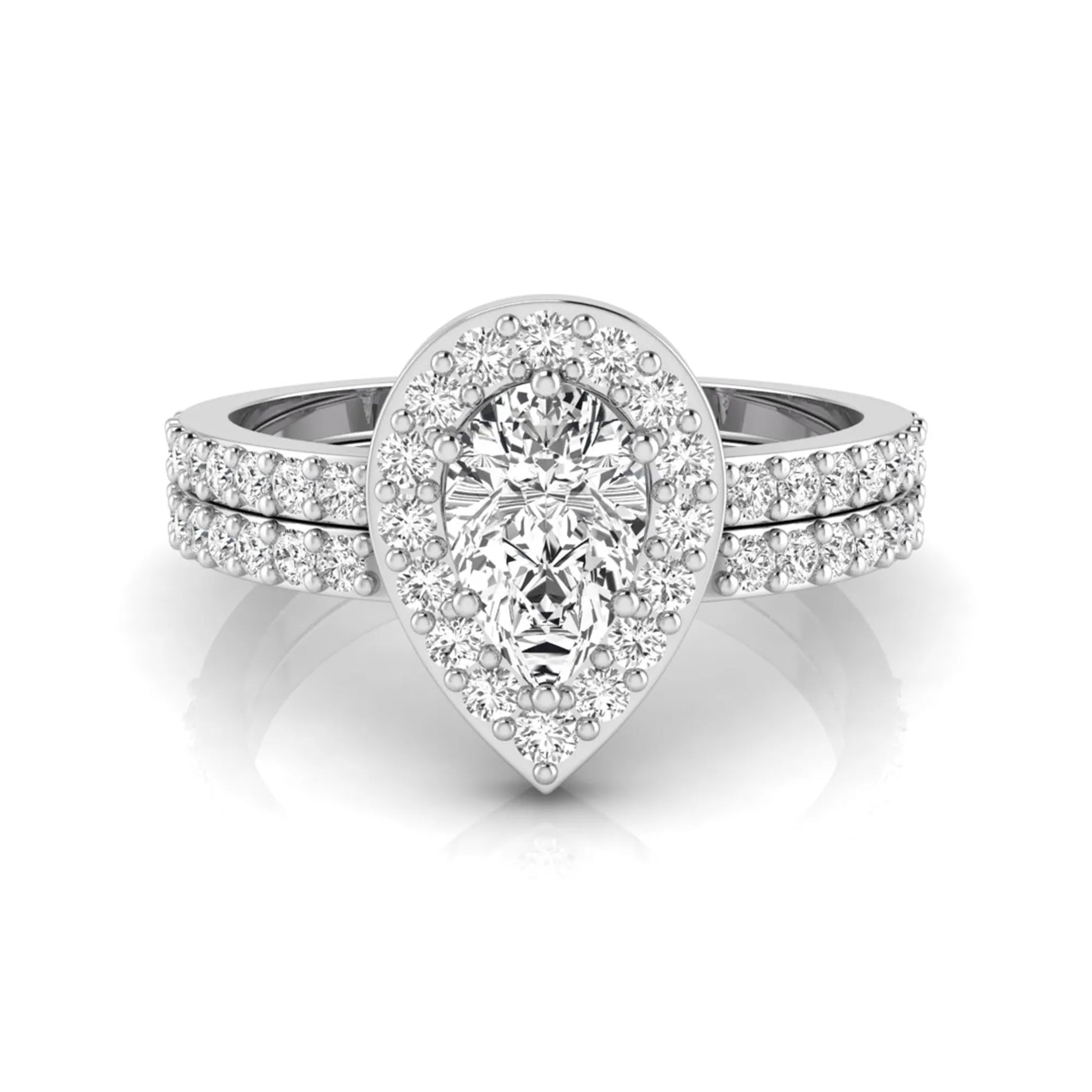 Pear cut lab grown diamond engagement ring with a round diamond halo and double-row pavé band in a white gold style design.
