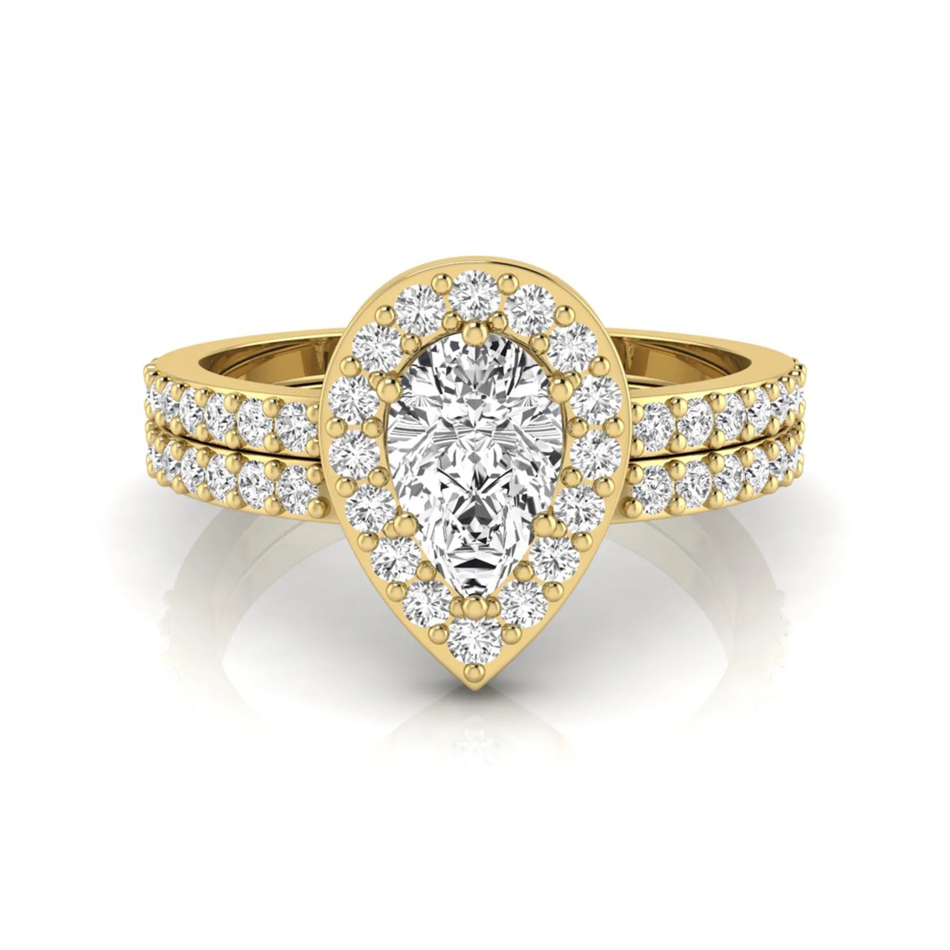 Pear cut lab grown diamond engagement ring with a round diamond halo and double-row pavé band in a yellow gold style design.