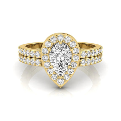 Pear cut lab grown diamond engagement ring with a round diamond halo and double-row pavé band in a yellow gold style design.