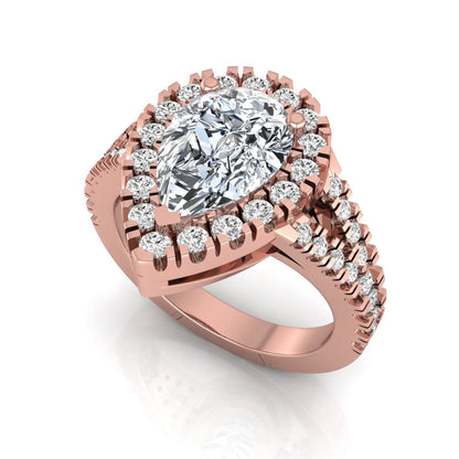 Pear cut halo lab grown diamond engagement ring with round accent diamonds and split shank design in rose gold metal tone