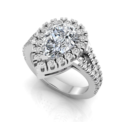 Pear cut halo lab grown diamond engagement ring with round accent diamonds and split shank design in white gold metal tone