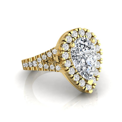 Pear cut halo lab grown diamond engagement ring with round accent diamonds and split shank design in yellow gold metal tone