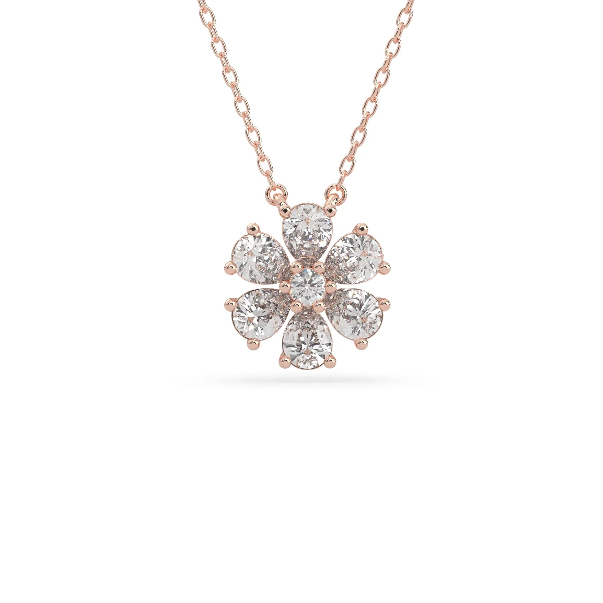 Pear cut and round lab grown diamond flower pendant necklace with prong setting in rose gold tone on chain.