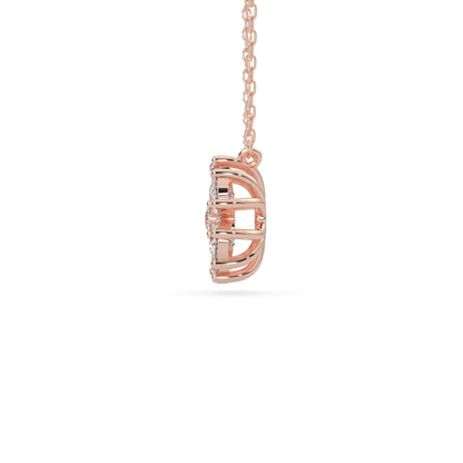 Pear cut and round lab grown diamond flower pendant necklace with prong setting in rose gold tone on chain.