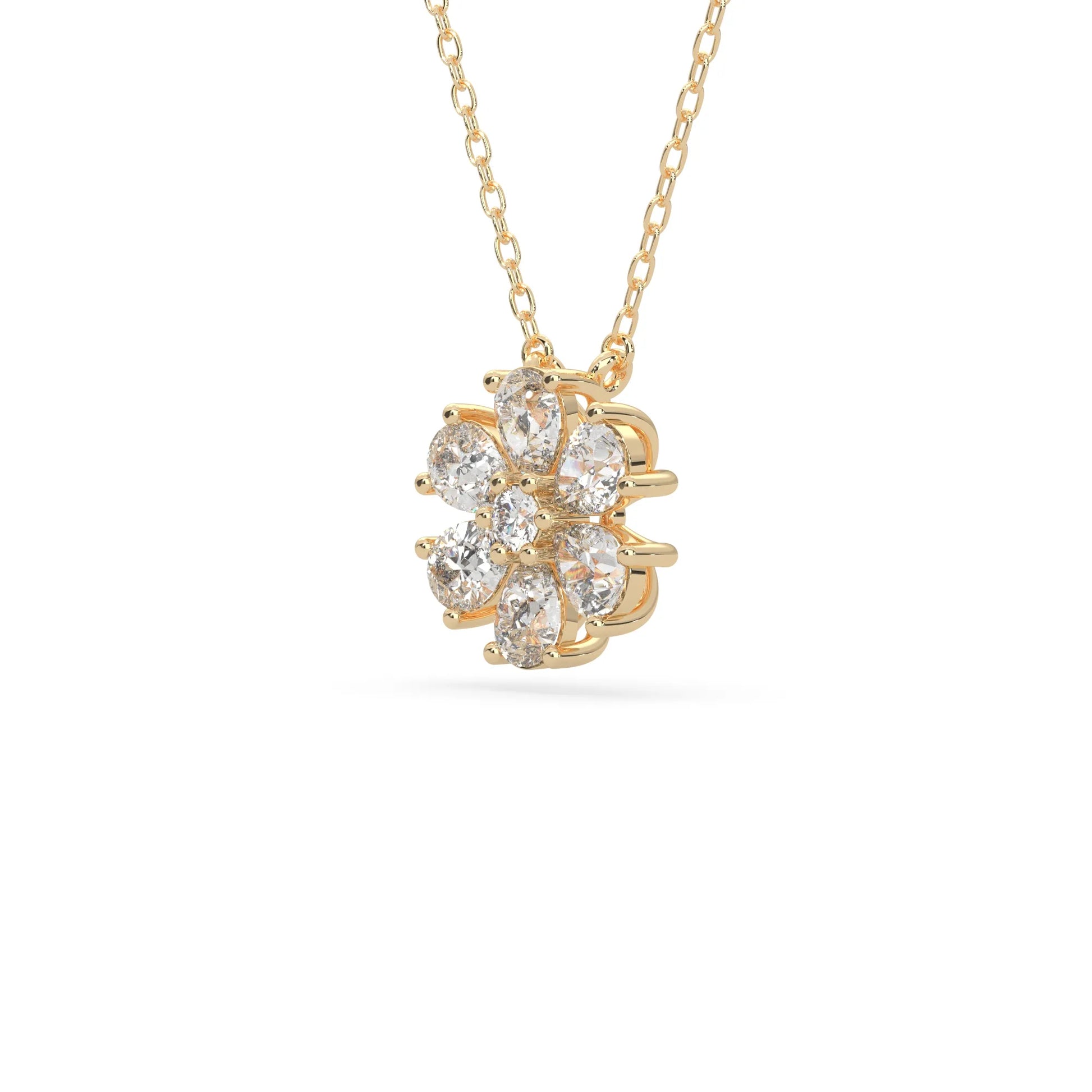 Pear cut and round lab grown diamond flower pendant necklace with prong setting in yellow gold tone on chain.