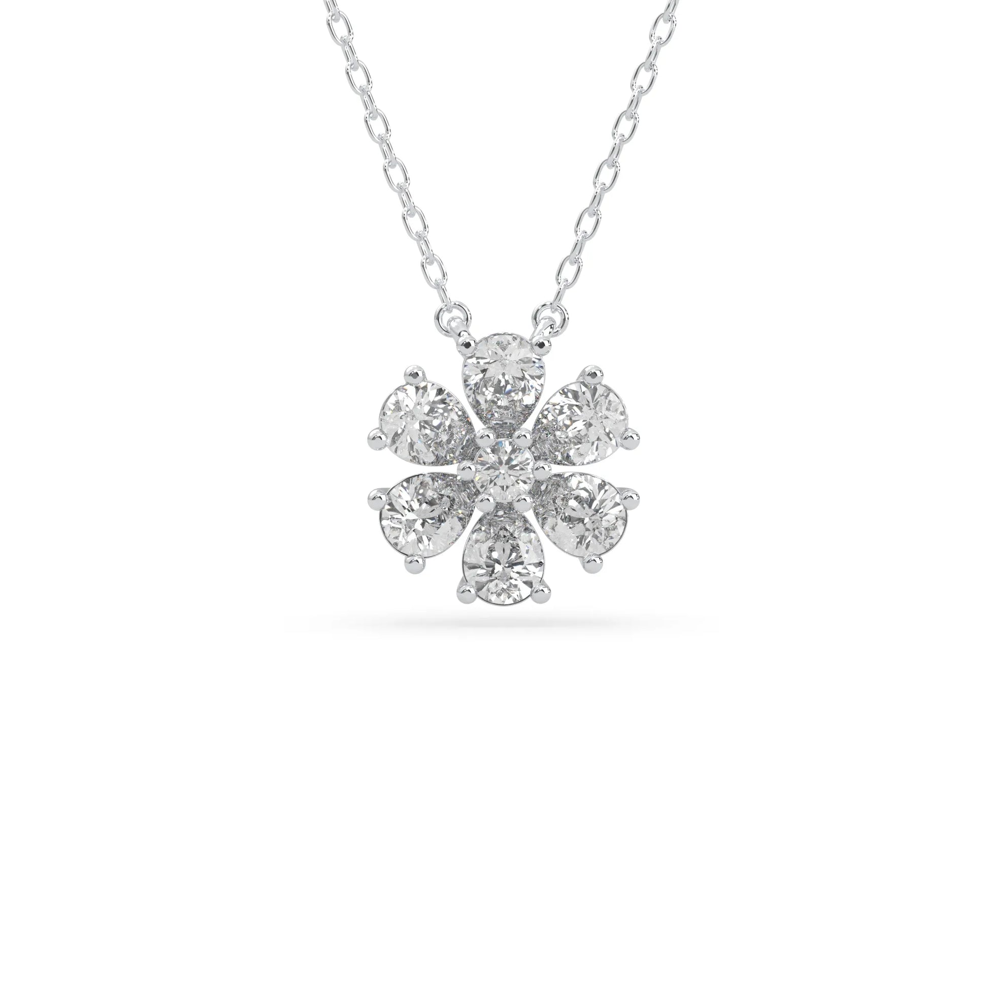 Pear cut and round lab grown diamond flower pendant necklace with prong setting in white gold tone on chain.