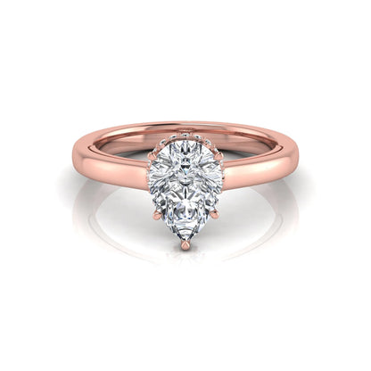 Pear cut lab grown diamond engagement ring featuring a hidden halo of round diamonds in a six-prong setting with a polished rose gold tone band.
