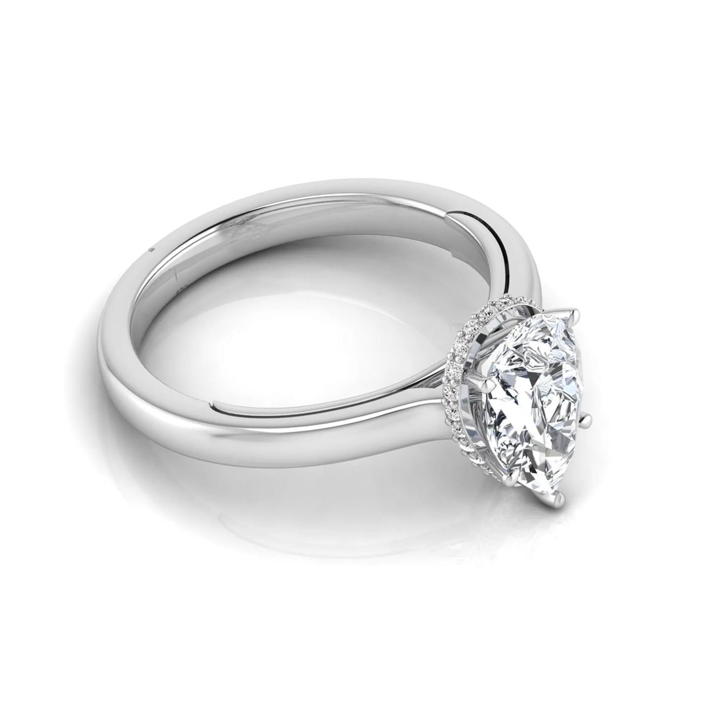 Pear cut lab grown diamond engagement ring featuring a hidden halo of round diamonds in a six-prong setting with a polished white gold tone band.