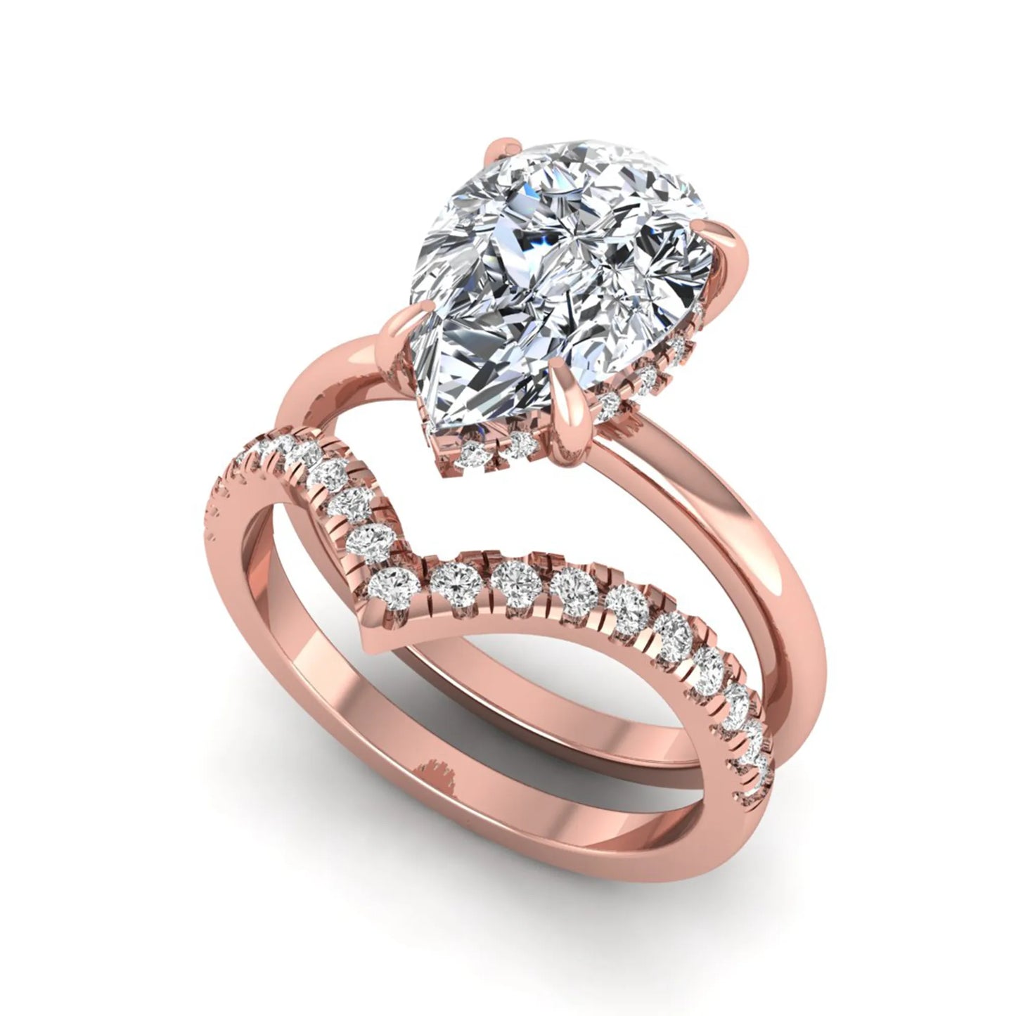 Pear cut lab grown diamond hidden halo solitaire bridal ring set featuring a four-prong engagement ring with a matching pavé chevron wedding band in rose gold.