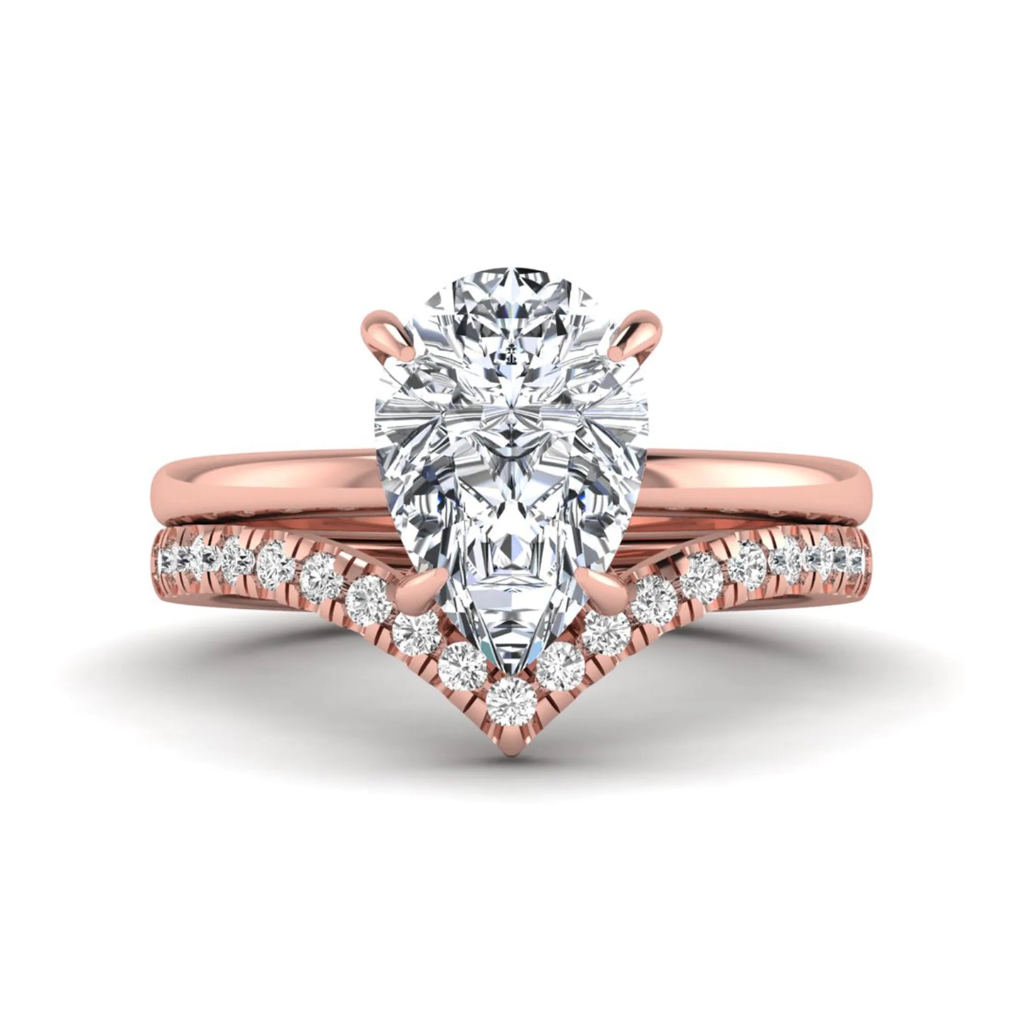 Pear cut lab grown diamond hidden halo solitaire bridal ring set featuring a four-prong engagement ring with a matching pavé chevron wedding band in rose gold.