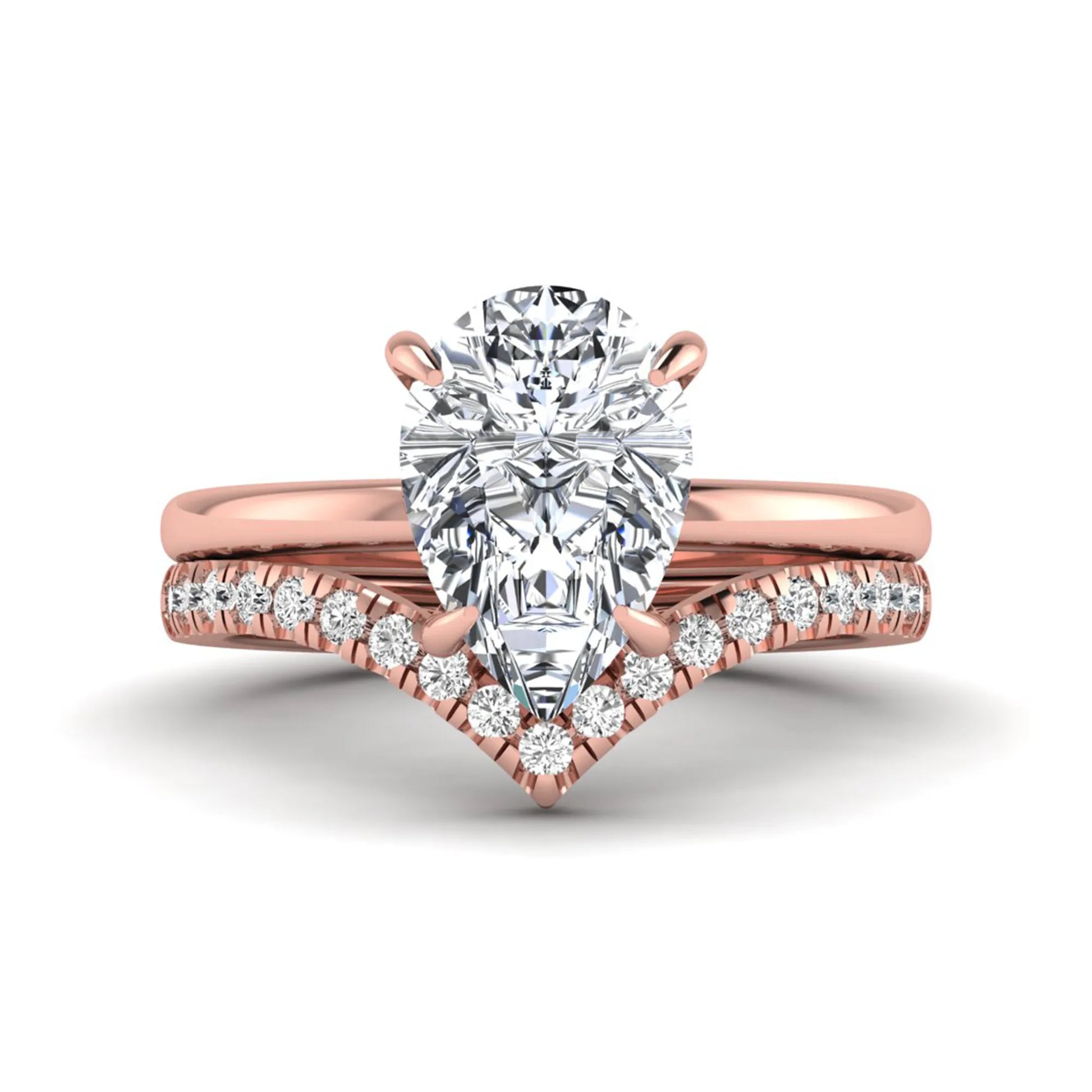 Pear cut lab grown diamond hidden halo solitaire bridal ring set featuring a four-prong engagement ring with a matching pavé chevron wedding band in rose gold.