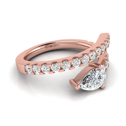 Pear cut lab grown diamond double wrap ring with pavé round diamond bands in polished rose gold.