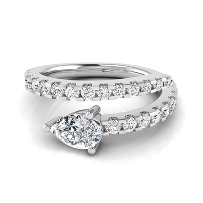 Pear cut lab grown diamond double wrap ring with pavé round diamond bands in polished white gold.
