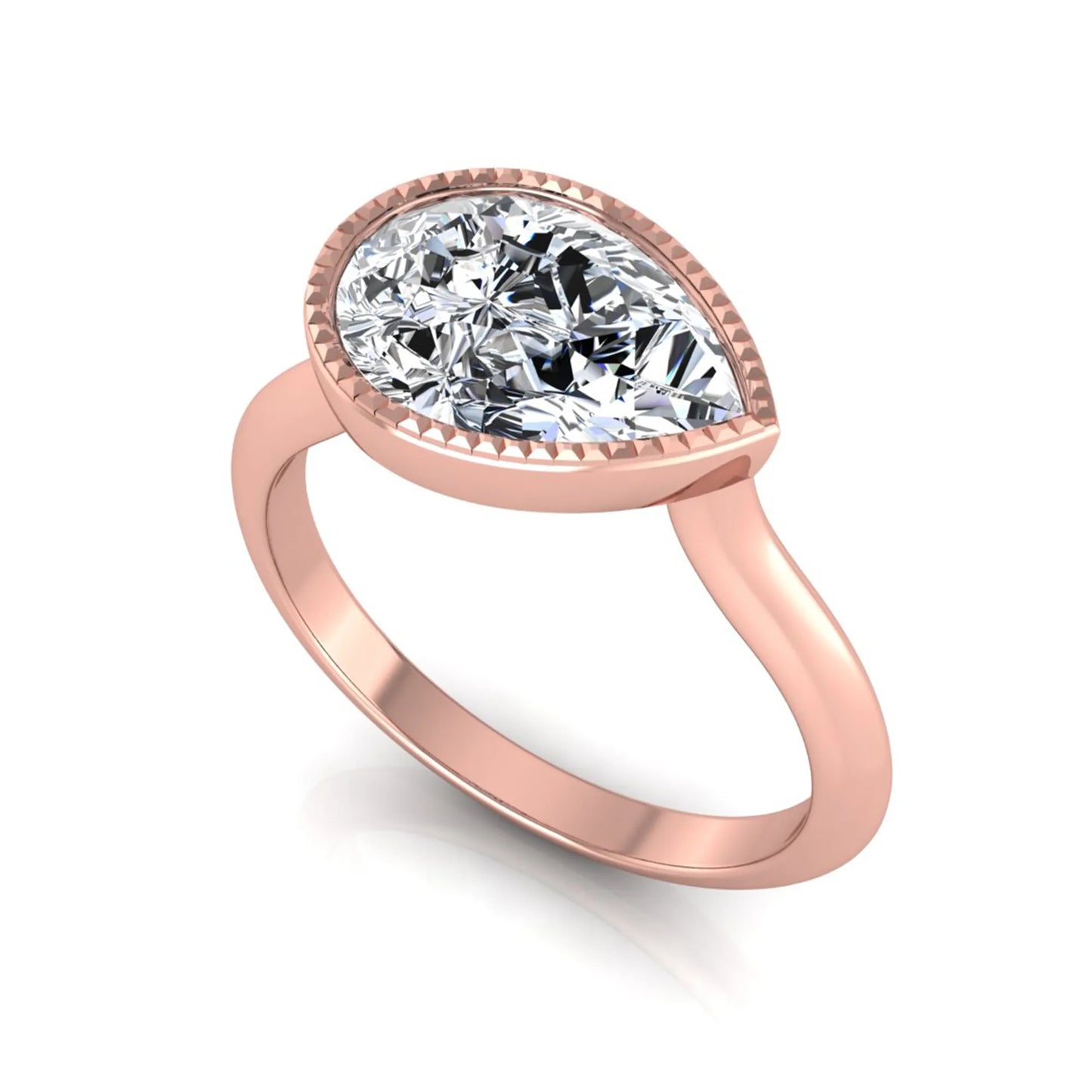 Pear cut lab grown diamond solitaire engagement ring featuring a milgrain bezel setting with a rose gold tone band.