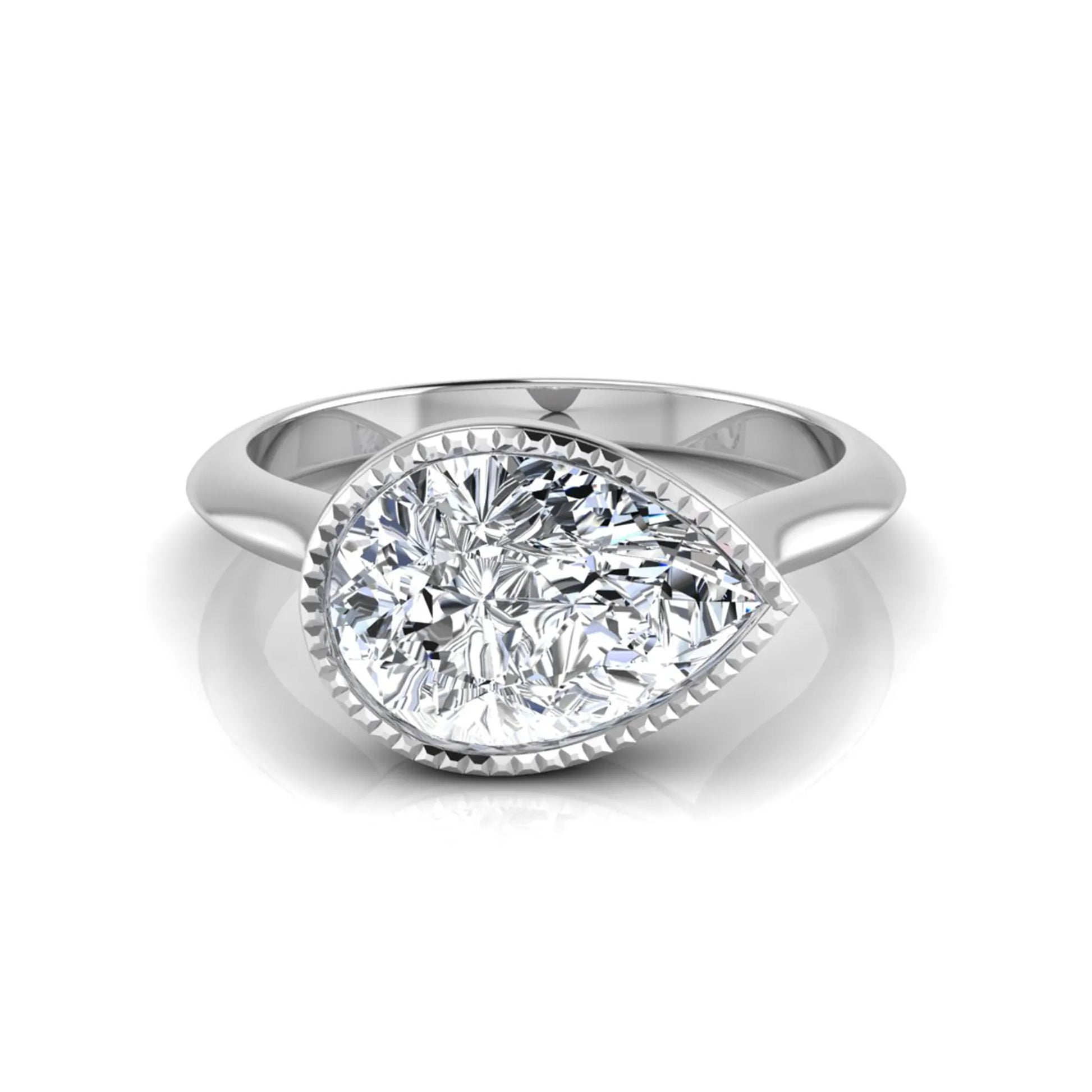 Pear cut lab grown diamond solitaire engagement ring featuring a milgrain bezel setting with a white gold tone band.