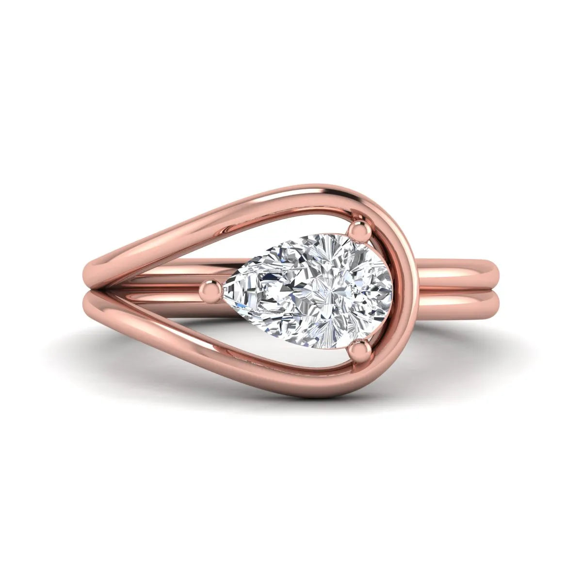 Pear cut lab grown diamond open frame solitaire engagement ring in a rose gold teardrop setting
